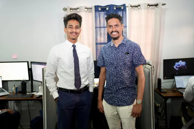Two OSS staff members at their Georgetown, Guyana office workspace